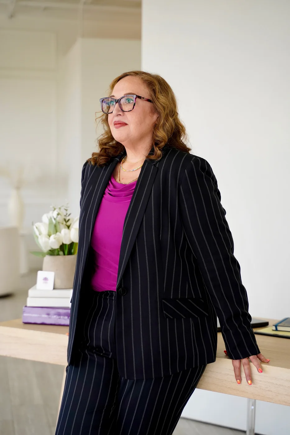 Jessica standing in her office